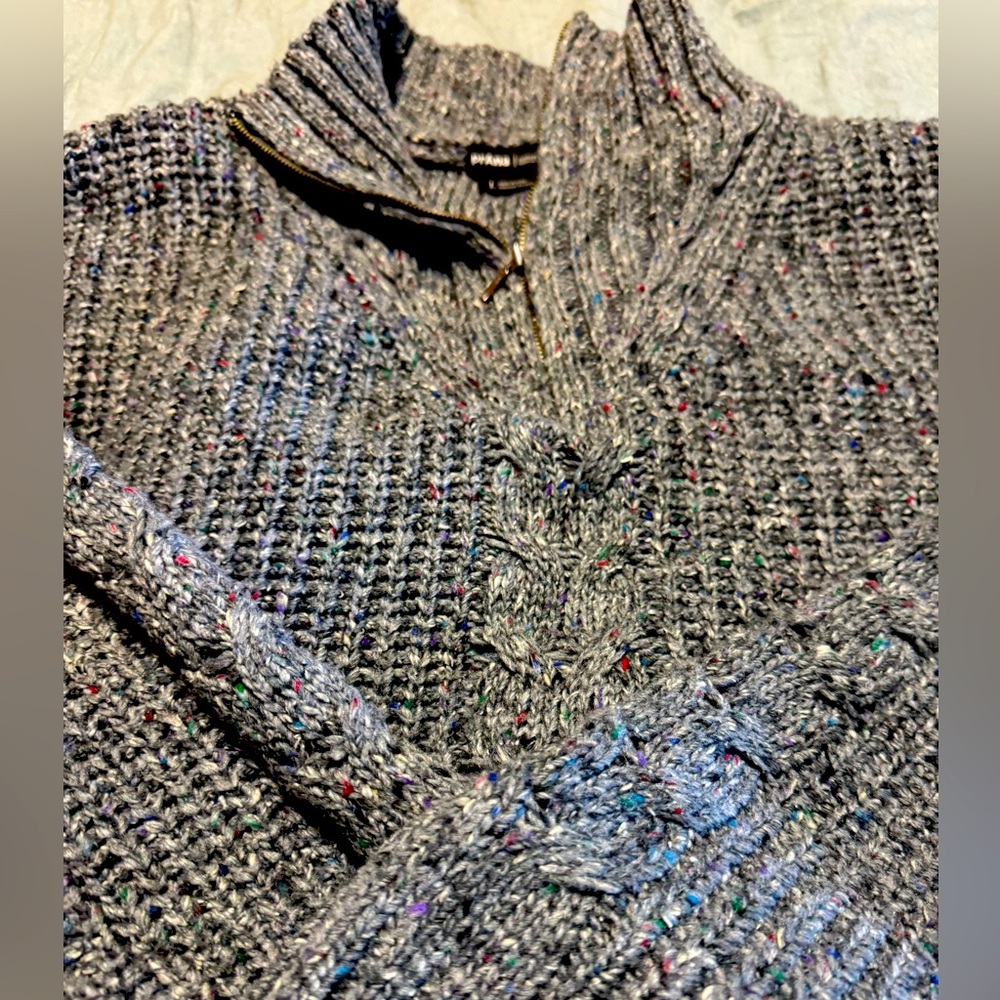 Grey wool/silk/poly blend chunky cable knit sweater.